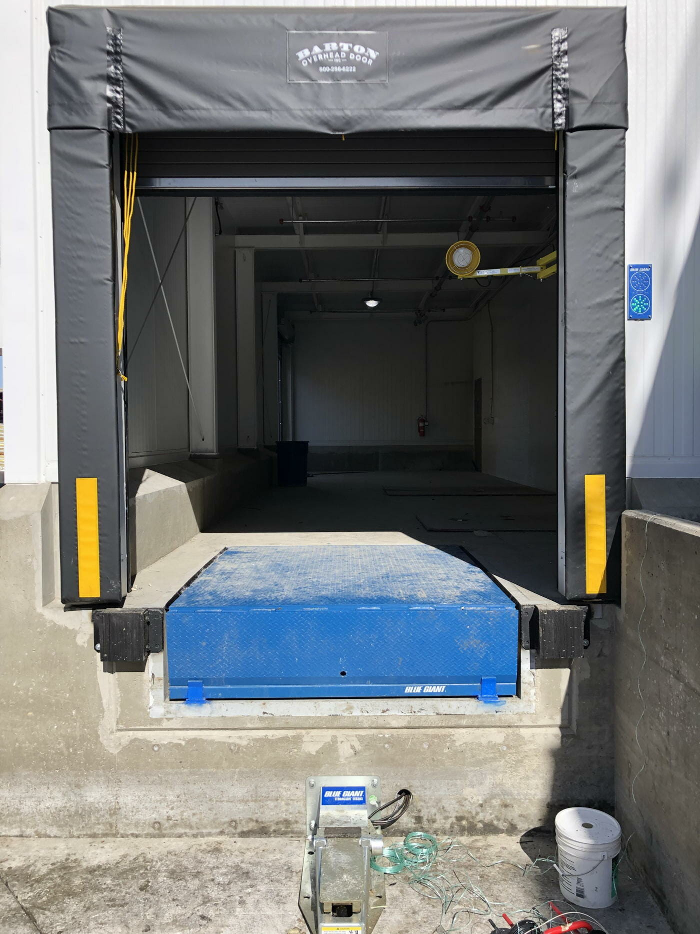 A Blue Giant loading dock, seal, and vehicle restraint installed.