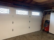 White Amarr garage door with decorative windows installed in Manteca