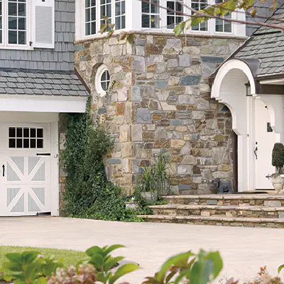 Amarr Classica carriage-house garage door in white and gray