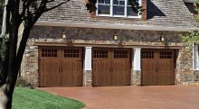 Amarr Classica Northampton garage door in Walnut with Madeira windows and Canterbury hardware