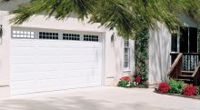 Amarr Heritage long panel garage door in True White with Stockton window inserts