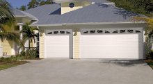 Amarr Heritage short panel garage door in True White with Sunray window inserts