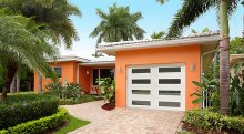 Amarr Heritage ribbed panel garage door in True White with clear Mosaic windows