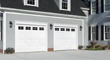 Amarr Heritage short panel garage door in True White with Stockton window inserts