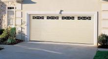Amarr Heritage long panel garage door in Almond with window inserts