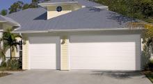 Amarr Heritage short panel garage door in True White with dark tint windows
