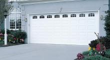 Amarr Heritage short panel garage door in True White with decorative glass