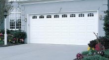 Amarr Heritage short panel garage door in True White with decorative glass