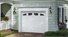 Amarr Heritage short panel garage door in True White with Sunray window inserts