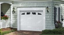 Amarr Heritage short panel garage door in True White with Sunray window inserts