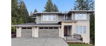 Amarr Northwoods Aspen Gray plank garage doors with long panel windows