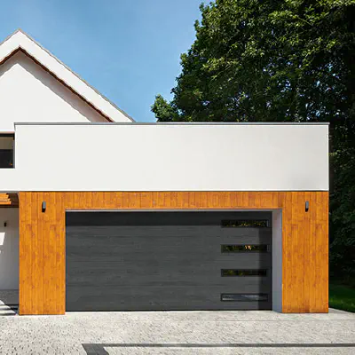 Amarr Northwoods Onyx plank garage door on a modern home