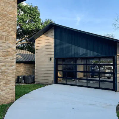 CHI full-view glass garage door with dark frame