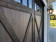 C.H.I. Shoreline 5602 walnut overlay garage door with arched Madison windows