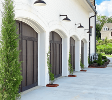 C.H.I. Shoreline overlay garage door with carriage-house trim and upper glass