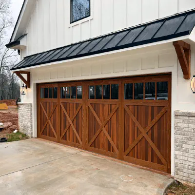 Cedar CHI Shoreline overlay garage door on a residential exterior