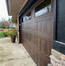 Walnut woodtone CHI Stamped Shaker garage door