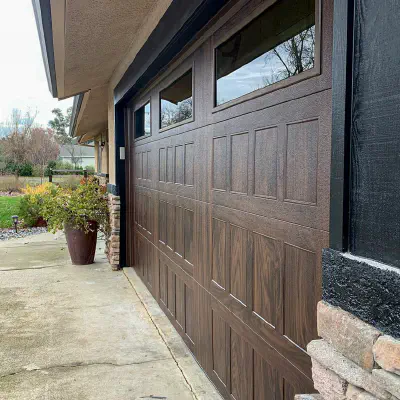 Walnut woodtone CHI Stamped Shaker garage door