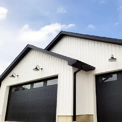 Black CHI Stamped Shaker garage door with clean panel lines