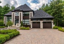 CHI Stamped Shaker garage door on a modern home