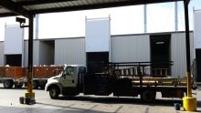 Barton service truck at agricultural fumigation-room doors