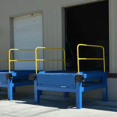 Blue Giant dock lifts installed outside a warehouse